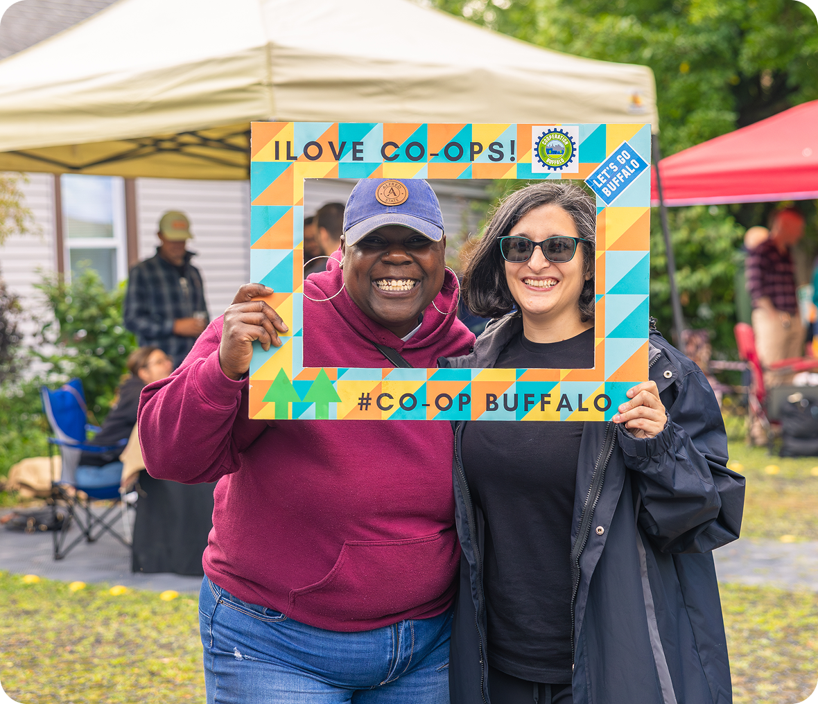 Happy pair enjoying coop event outdoors