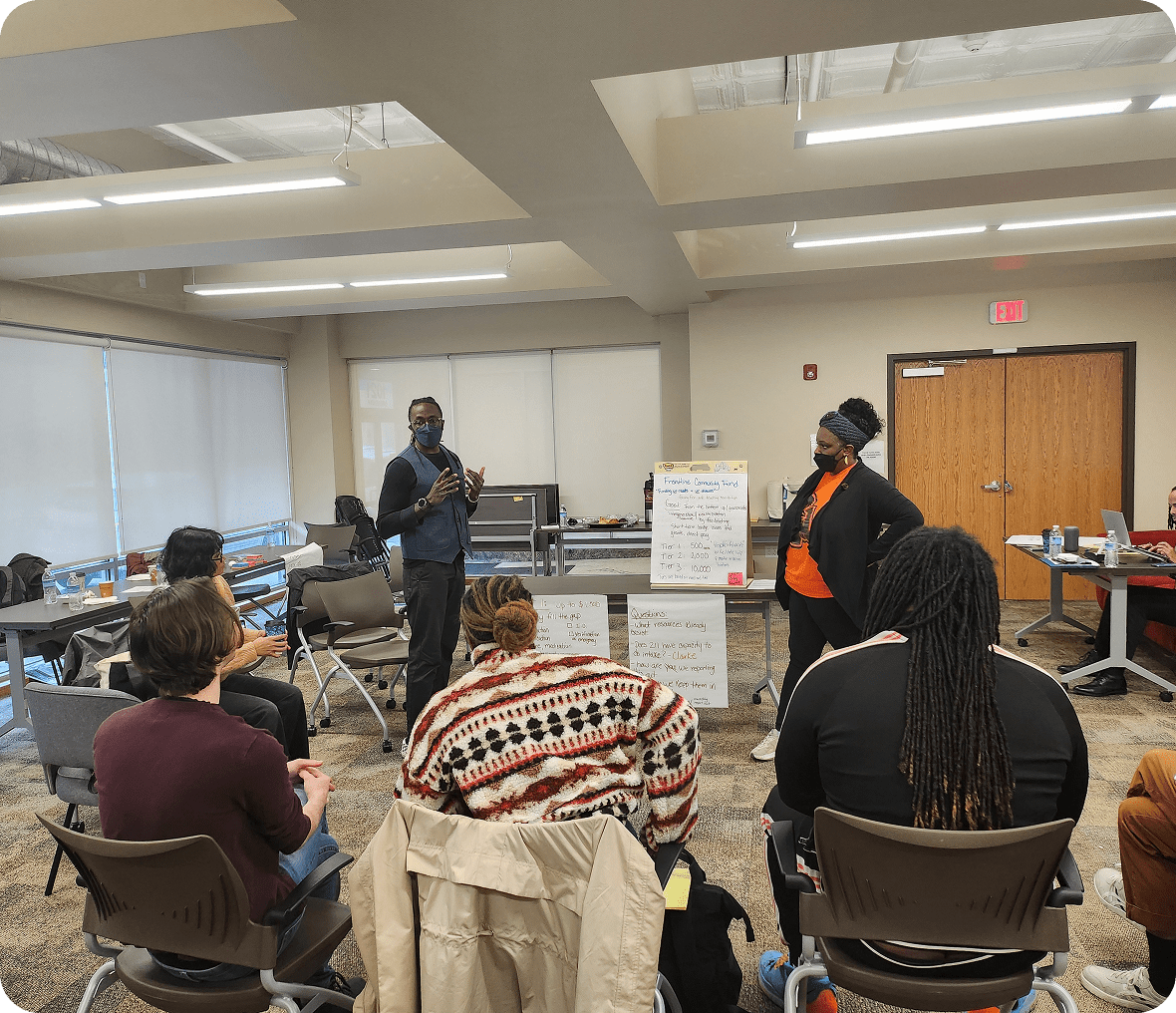 Meeting participants seated in a circle