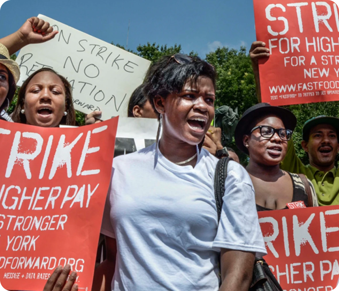 Group holding strike signs