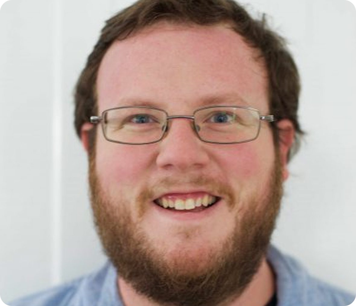 Happy man in blue shirt